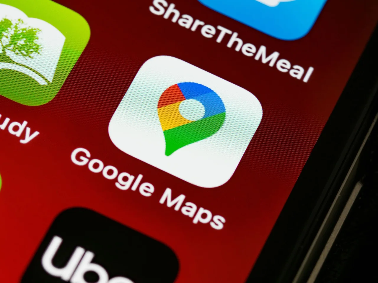 Google Maps app icon on a smartphone screen.